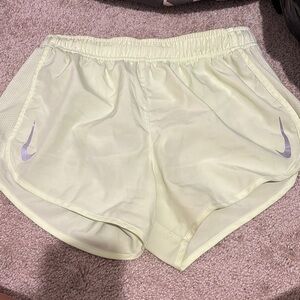 Nike Women's Pale Yellow Athletic Shorts